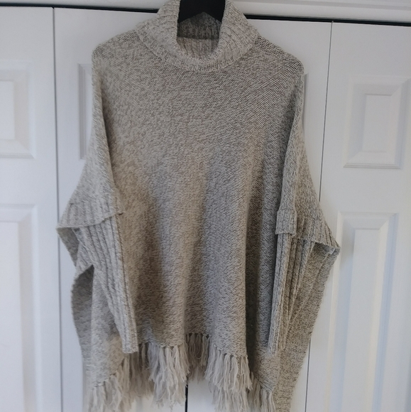 Ardene Sweaters - Long sleeve fringed sweater poncho Sz. M